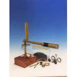 A BRASS STUDENTS MONOCULAR MICROSCOPE, A MAHOGANY MOUNTED BRASS THREE DRAWER TELESCOPE, THE