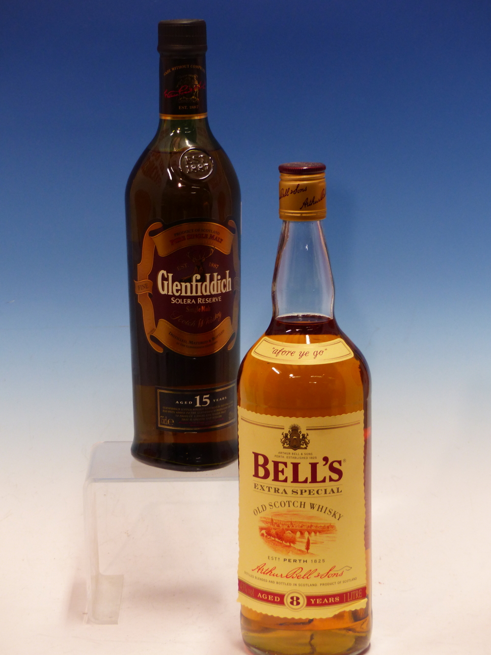 WHISKEY. GLENFIDDICH SOLERA RESERVE SINGLE MALT 1 x 75cl BOTTLE TOGETHER WITH BELLS 1 x 1L.