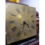 AN 18th.C.OAK CASED LONG CASE CLOCK WITH BRASS DIAL.