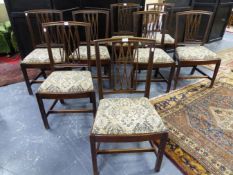 A SET OF EIGHT GEO.III.MAHOGANY DINING CHAIRS WITH LATTICE BACKS ON SQUARE SECTION LEGS. (8)