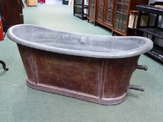 A LARGE 19th.C.FRENCH GALVANSED AND TOLE PAINTED FREE STANDING BATHTUB.