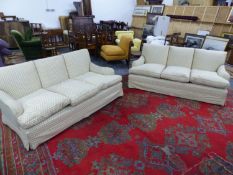 A PAIR OF BESPOKE PORTMAN UPHOLSTERY HOWARD STYLE DEEP SEAT THREE SEAT SETTEES LABELLED TO