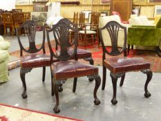 A GOOD SET OF TWELVE ANTIQUE GEORGIAN STYLE MAHOGANY DINING CHAIRS WITH SHIELD BACKS, LEATHER OVER