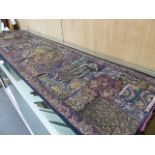 AN INDIAN METAL THREAD EMBROIDERED SILK AND VELVET PANEL, THE W-SHAPED NARROW ENDS WITH PAIRS OF