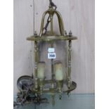 A BRASS AND CUT CYLINDRICAL GLASS THREE LIGHT LANTERN WITH FITTINGS, THE LANTERN. H 44cms.