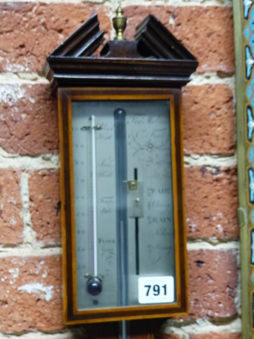 AN EARLY 19th.C.MAHOGANY AND INLAID CASED STICK BAROMETER TURNED RESERVOIR COVER, EXPOSED STEM AND