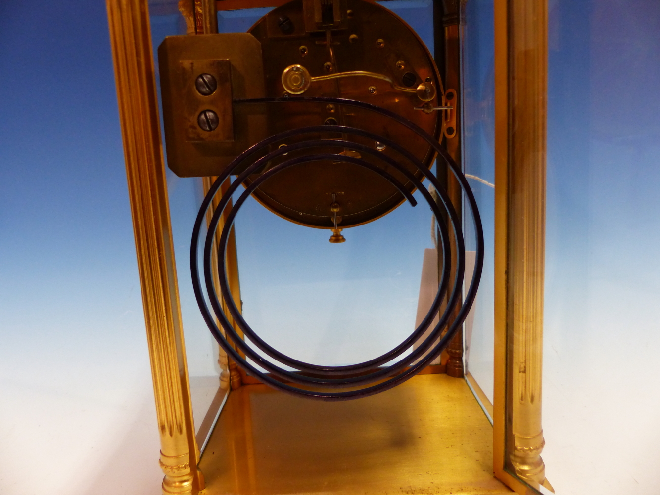 A FRENCH GILT METAL MOUNTED BEVELLED GLASS CASED MANTEL CLOCK STRIKING ON A COILED ROD, THE - Image 14 of 18