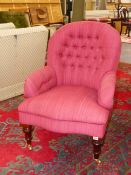 A BESPOKE VICTORIAN STYLE (PALE) WINE RED UPHOLSTERED SALON ARMCHAIR BY PETER DUDGEON ON TURNED