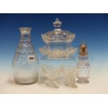 A PAIR OF CUT CLEAR GLASS NAVETTE SALTS, A CARAFE, A SWEETMEAT COVERED BOWL AND STAND AND A SHAKER