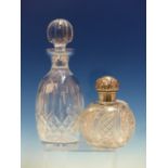A VICTORIAN SILVER MOUNTED CUT GLASS LARGE SCENT BOTTLE TOGETHER WITH A BOXED WATERFORD CRYSTAL