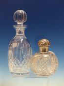 A VICTORIAN SILVER MOUNTED CUT GLASS LARGE SCENT BOTTLE TOGETHER WITH A BOXED WATERFORD CRYSTAL