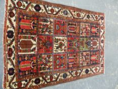 A PERSIAN BAKHTIARI RUG 220 x 155cms.