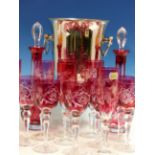 A SET OF SIX ROYAL DOULTON RUBY OVERLAY CUT GLASS WINES, SIX BOHEMIAN RUBBY OVERLAY CHAMPAGNE