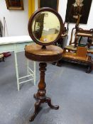 A VICTORIAN MAHOGANY SHAVING STAND ON TRIPOD SUPPORT.