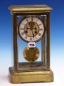 ATTRIBUTED TO HONORE PONS, A BEVELLED GLAZED BRASS CASED PENDULUM CLOCK STRIKING ON A BELL, THE DIAL