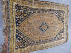 TWO ANTIQUE PERSIAN QASHGHAI RUGS TOGETHER WITH A PERSIAN BAKHTIARI RUG LARGEST. 226 x 150cms.