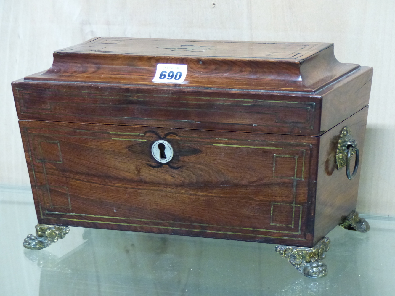 A REGENCY ROSEWOOD AND BRASS INLAID SARCOPHAGUS FORM TEA CADDY WITH BRASS RING HANDLES AND FEET. W. - Image 2 of 7