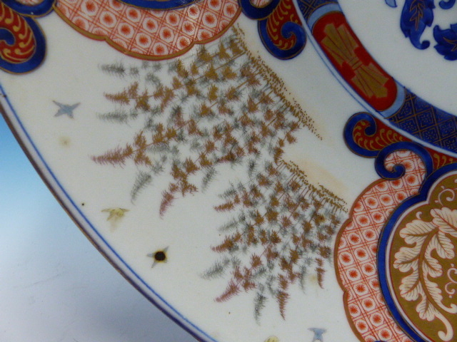 A FUKUGAWA IMARI DISH, THE RUYI FRAMED FLORAL LAPPETS ALTERNATING WITH STANDS OF BAMBOO AND - Image 7 of 18