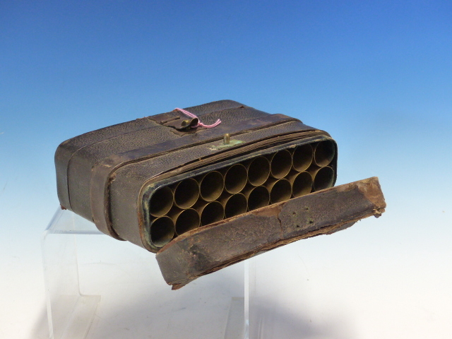 A JAMES DIXON AND SONS, SHEFFIELD LEATHER MOUNTED DOUBLE ENDED CARTRIDGE MAGAZINE, THE ENDS