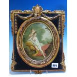 19th.C.CONTINENTAL SCHOOL. AN OVAL SCENE OF VENUS AND CUPID, OIL ON BOARD IN AN ELABORATE GILT AND