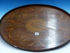 A BEVELLED GLASS RECTANGULAR MIRROR WITH SERPENTINE SHAPED TOP AND WITHIN A WALNUT FRAME. 56 x