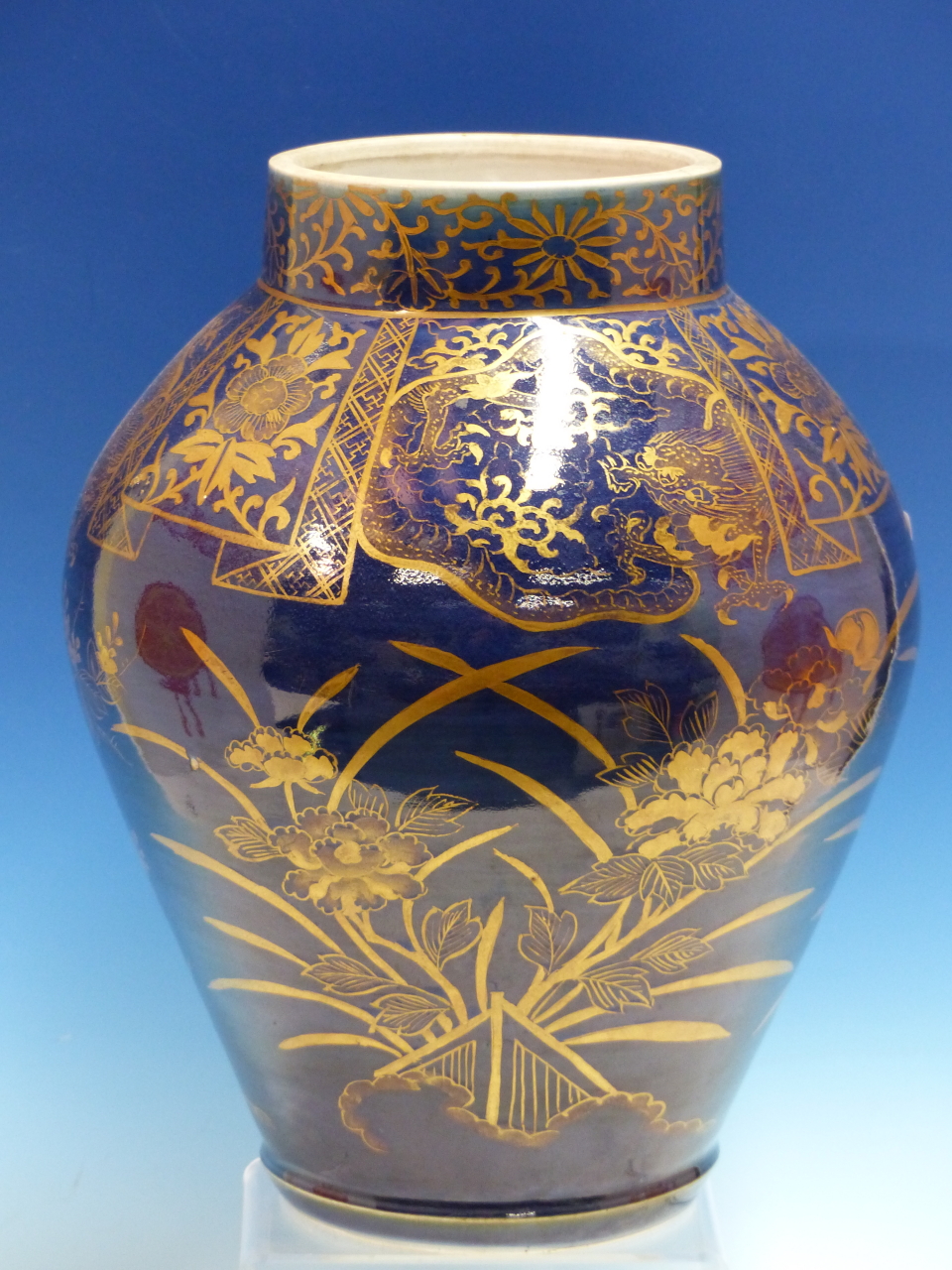 A FRENCH BLUE GROUND JAR GILT WITH CHINOISERIE. H 33.5cms.