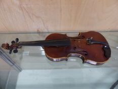 A CASED VIOLIN, THE BACK. 35.5 cms. THE OVERALL LENGTH. 61cms