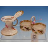 A MEISSEN FLOWER PAINTED CHAMBERSTICK. H 6cms. TOGETHER WITH A MEISSEN DOUBLE SALT PAINTED WITH