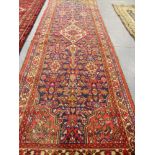 A PERSIAN HAMADAN RUNNER 300 x 97cms.