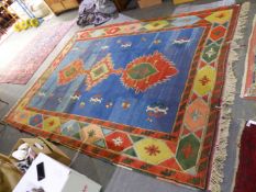 A TURKISH TRIBAL CARPET 352 x 250cms.