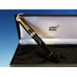 A MONT BLANC MEISTERSTUCK FOUNTAIN PEN WITH A 14K GOLD NIB, COMPLETE WITH CASE.