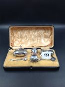 A SILVER HALLMARKED WALKER AND HALL CASED CONDIMENT SET. (ONE ODD SILVER SPOON). GROSS WEIGHT 198.