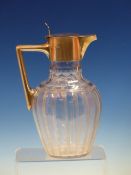 A SILVER MOUNTED CUT GLASS CLARET JUG BY WALKER AND HALL, SHEFFIELD 1899, THE OVOID BODY CUT WITH