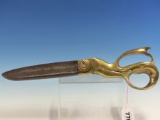 A PAIR OF T WILKINSON AND SONS SHEFFIELD BRASS HANDLED TAILOR'S SCISSORS. W 37cms