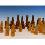 ATTRIBUTED TO VINCENZO FIGLIO, VAL GARDENA, A 1920'S LIMEWOOD ANIMALIER CHESS SET, THE KINGS. H