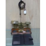 A SET OF BRASS POSTAL SCALES, THE SERPENTINE FRONTED MAHOGANY BASE. W 30cms. A LEATHER WALLET