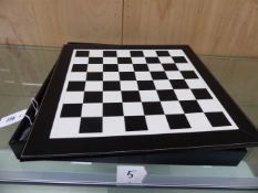 AN ASPREY'S BLACK AND WHITE BOX CHESS BOARD WITH BOX AND EBONY STAUNTON PATTERN CHESS AND