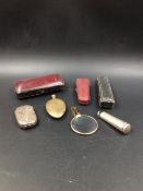 FOUR CASED CHEROOTS, A VICTORIAN SILVER HALLMARKED VESTA DATED 1888 AND A SILVER HALLMARKED