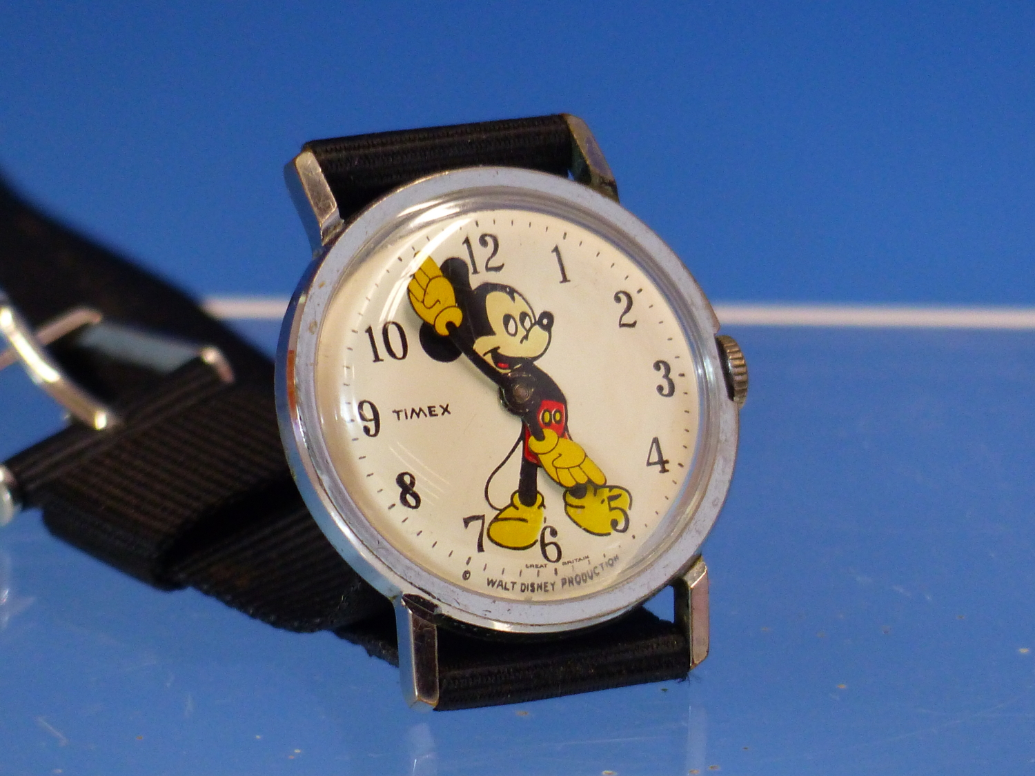 A VINTAGE MANUAL WOUND TIMEX MICKEY MOUSE WRIST WATCH. INCLUDED ARE PHOTOGRAPHS FROM A RECENT