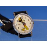 A VINTAGE MANUAL WOUND TIMEX MICKEY MOUSE WRIST WATCH. INCLUDED ARE PHOTOGRAPHS FROM A RECENT