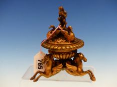 A RENAISSANCE STYLE BRONZE INKWELL, THE GADROONED BOWL ON THE BACK OF THREE WINGED HORSES, THE COVER