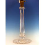 A SEVEN SIDED CLEAR GLASS COLUMNAR TABLE LAMP WITH ORMOLU PALM LEAF CAPITAL AND STAR CUT CIRCULAR
