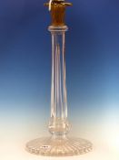 A SEVEN SIDED CLEAR GLASS COLUMNAR TABLE LAMP WITH ORMOLU PALM LEAF CAPITAL AND STAR CUT CIRCULAR