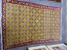 AN ORIENTAL RUG OF UNUSUAL DESIGN 170 x 118cms.