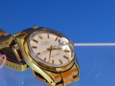 A VINTAGE ROLEX OYSTER PERPETUAL WATCH WITH DATE. WATCH REF NUMBER 1550 POSSIBLY THE "GOLDEN EGG".
