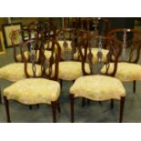 A SET OF EIGHT ADAMS STYLE MAHOGANY DINING CHAIRS ON CARVED AND FLUTED FORELEGS. (8)