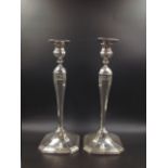 A PAIR OF AMERICAN STERLING STAMPED LOADED CANDLESTICKS. HEIGHT 32cms.