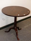 A GEO.III.MAHOGANY BIRDCAGE TILT TOP TRIPOD TABLE. Dia.66 x H.36cms.