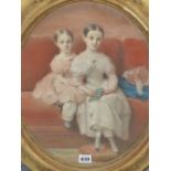 P.JOURDY (1805-1856) AN OVAL PORTRAIT OF TWO GIRLS, SIGNED PASTEL. 42 x 34cms.