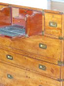 A GOOD 19th.C.MAHOGANY AND BRASS BOUND CAMPAIGN CHEST FITTED WITH CENTRAL UPPER FALL FRONT